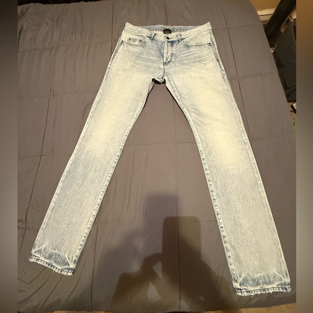 Yves Saint Laurent Slim Blue Jeans with Distressed Finish